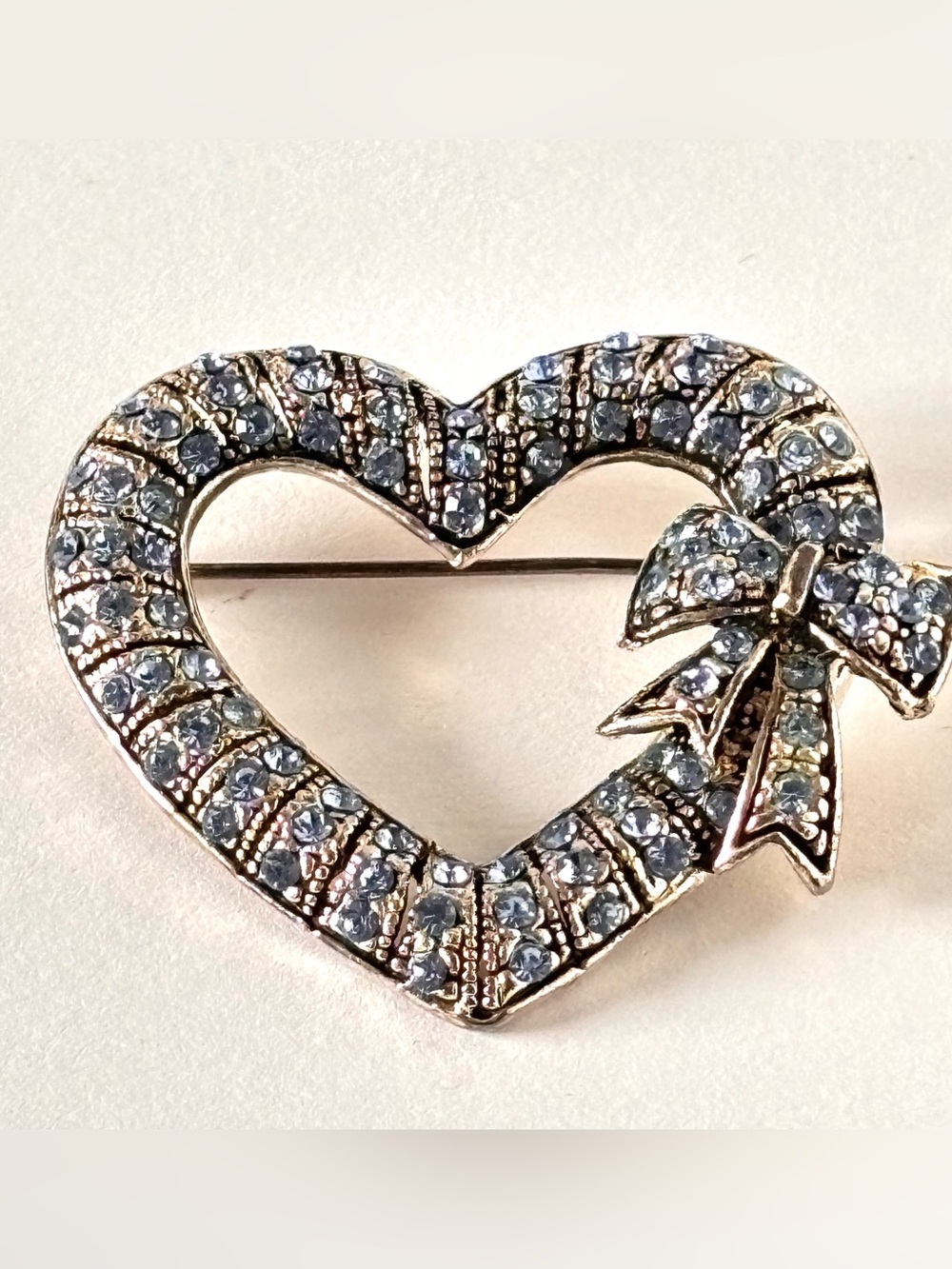Vintage baby blue rhinestones heart brooch with bow